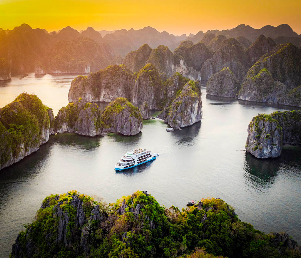 Relish every moment as you sail through Halong Bay’s dreamlike scenery